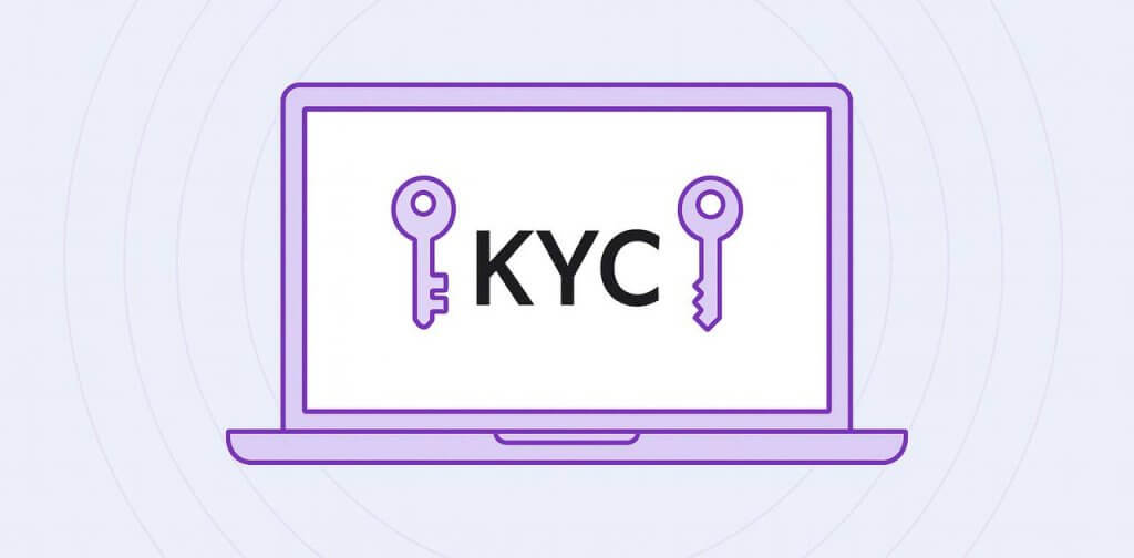 A minimalist flat-style digital illustration featuring a silver-gray laptop with the word 'KYC' displayed on its screen, flanked by two purple key icons. The background is a soft lavender color with concentric purple circles radiating outward, creating a clean and modern design.
